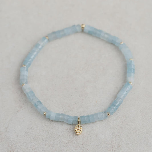 Earthly Abundance aquamarine mosaic bracelet featuring vibrant blue-green stones arranged in intricate pattern.