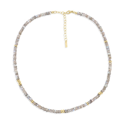 Labradorite power necklace from Earthly Abundance featuring a polished labradorite pendant on a dark cord.