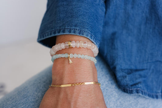 Earthly Abundance Morganite smooth rondel bracelet with 8mm beads, showcasing soft pink gemstones on a delicate jewelry piece.