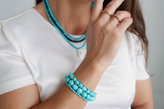 Bold Sky Sleeping Beauty turquoise pendant by Earthly Abundance, featuring a vibrant blue gemstone set in a silver jewelry setting.