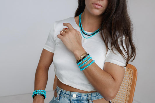 Black Ethiopian Opal beaded necklace featuring vibrant, polished beads strung on a delicate cord, showcasing elegant Ethiopian gemstone jewelry.
