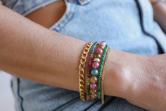 Colorful Rock Candy mixed tourmaline bracelet featuring vibrant, polished stones on a delicate elastic band, by Earthly Abundance.