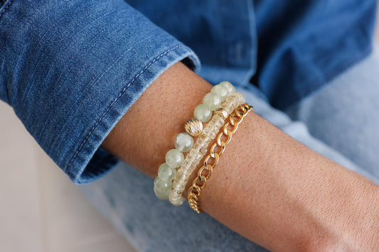 Green Glow Prehnite bracelet featuring smooth round beads, natural green color, and a subtle shimmer, crafted by Earthly Abundance.