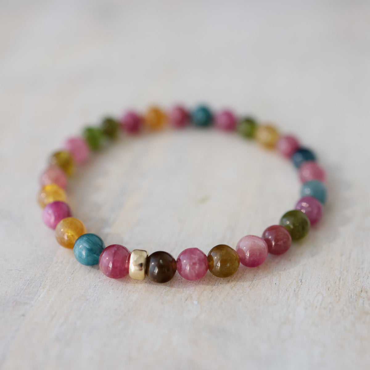 Colorful Rock Candy Mixed Tourmaline bracelet featuring vibrant, polished tourmaline stones on a stretch band.