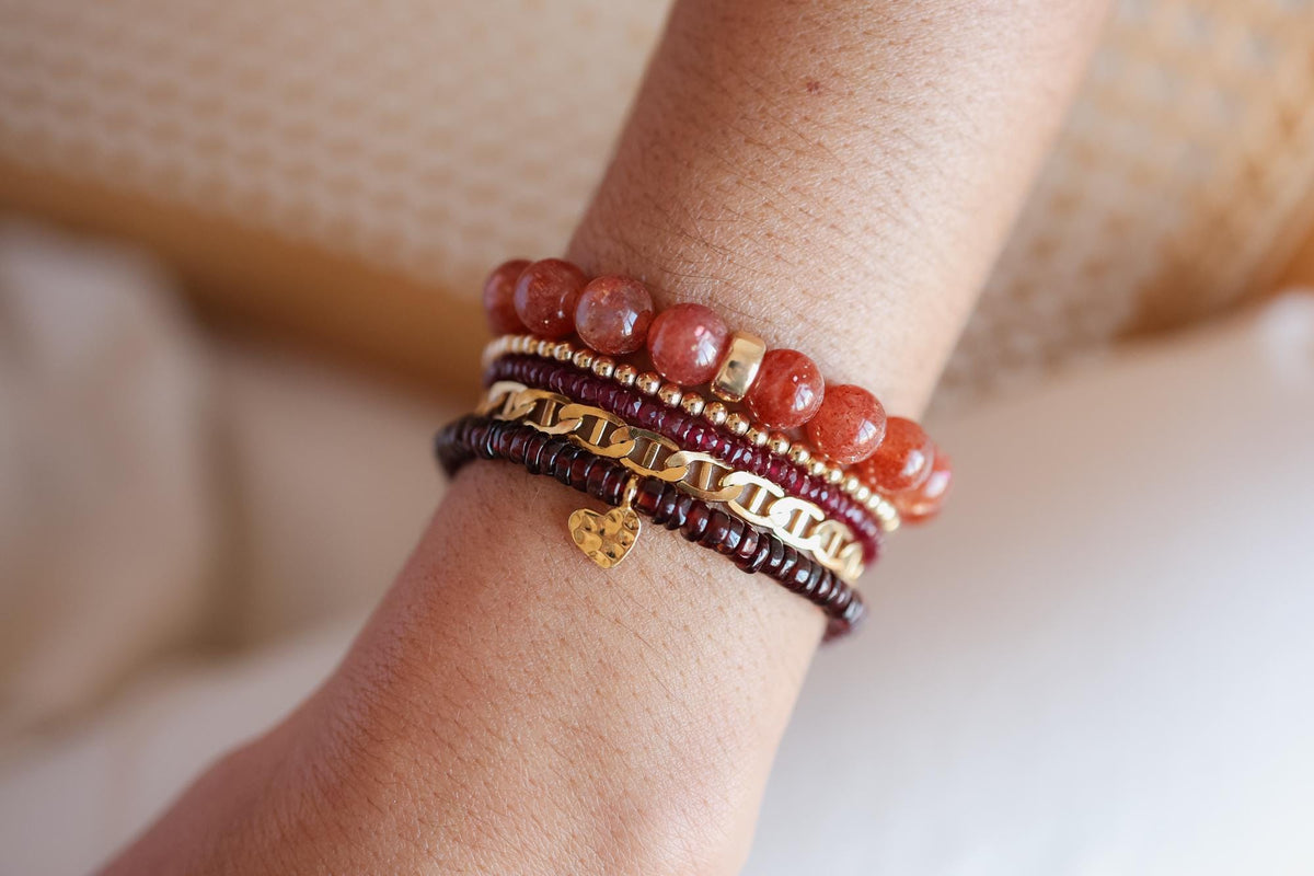 Golden Ember Sunstone bracelet made with 14K gold, featuring warm, shimmering sunstone beads from Earthly Abundance.