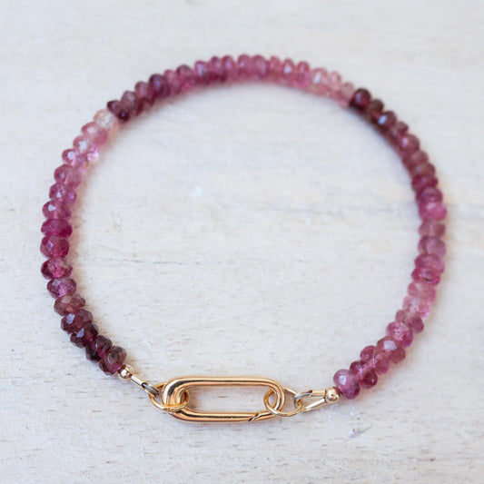 Soft Radiance pink tourmaline carabiner bracelet by Earthly Abundance Jewelry on a white background