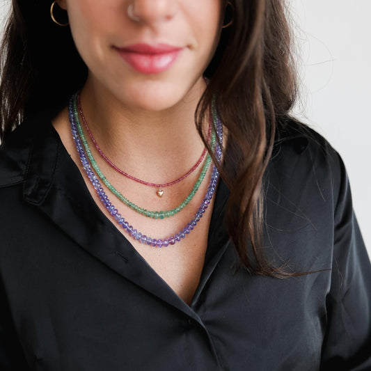 Rubellite Tourmaline necklace featuring vibrant pink and red stones on a delicate chain, from Earthly Abundance.
