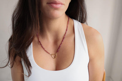 Raspberry tourmaline heart carabiner necklace by Earthly Abundance, featuring a polished pink gemstone pendant