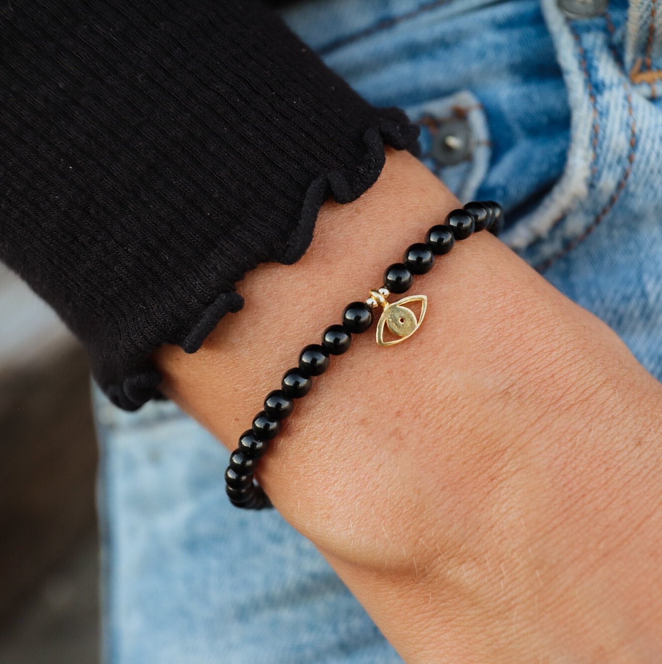 Black tourmaline evil eye hotsell